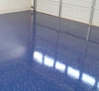 Epoxy painted blue garage floor.